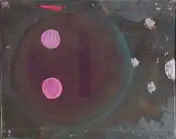 A dark orb holding two pink dots, with small hash sparks around it